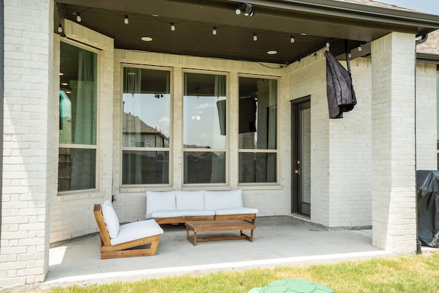 view of patio featuring outdoor lounge area and grilling area