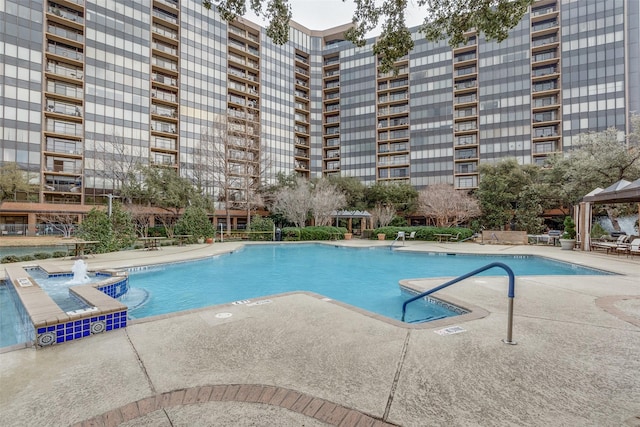 view of swimming pool with a patio area and a gazebo