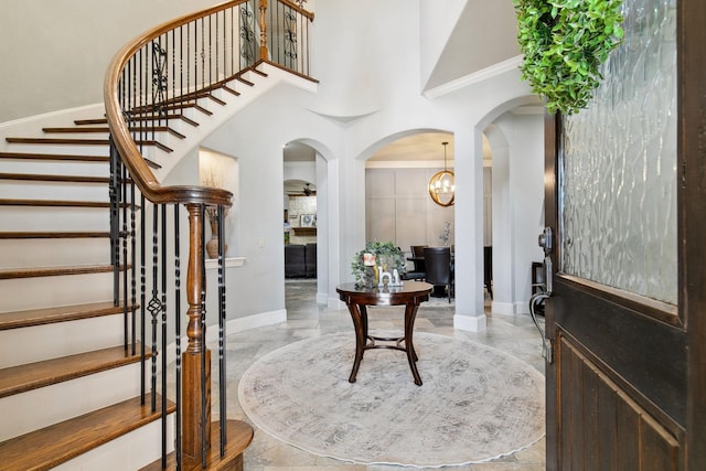 entryway with crown molding