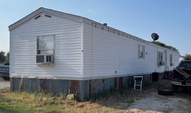 view of property exterior with cooling unit