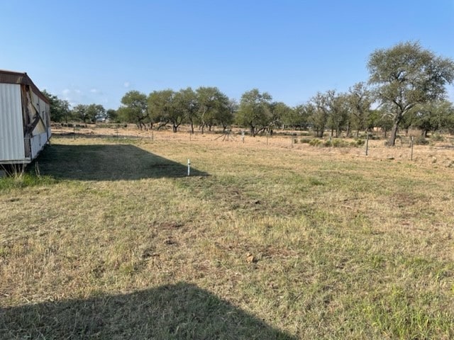 view of yard featuring a rural view