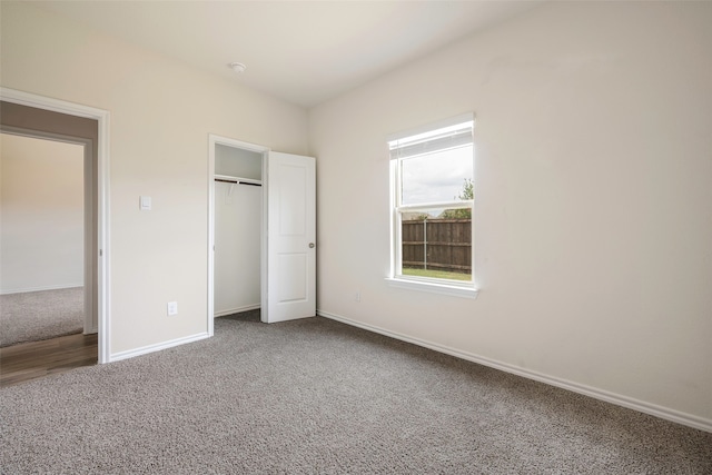 unfurnished bedroom featuring carpet floors