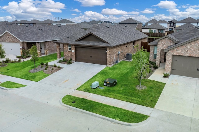 view of front of house with cooling unit and a front lawn