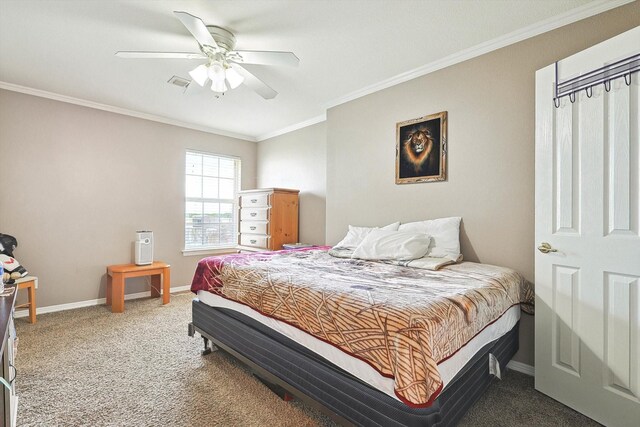 carpeted bedroom with crown molding and ceiling fan