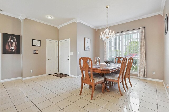 tiled dining area with a chandelier and ornamental molding