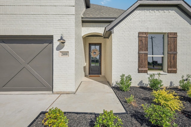 property entrance with a garage