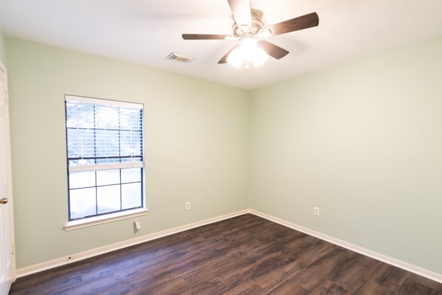 spare room featuring ceiling fan and hardwood / wood-style flooring