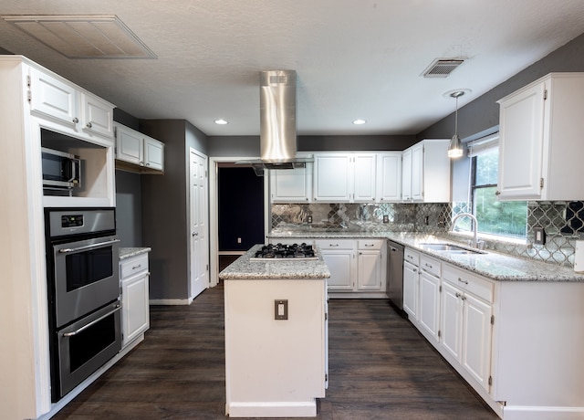 kitchen featuring white cabinetry, dark hardwood / wood-style flooring, island range hood, and sink