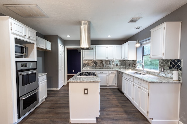 kitchen with dark hardwood / wood-style flooring, white cabinets, and island range hood