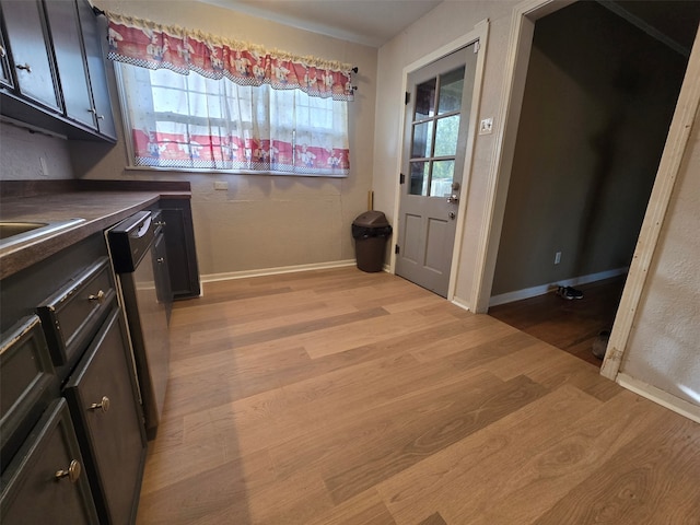 washroom with light hardwood / wood-style flooring