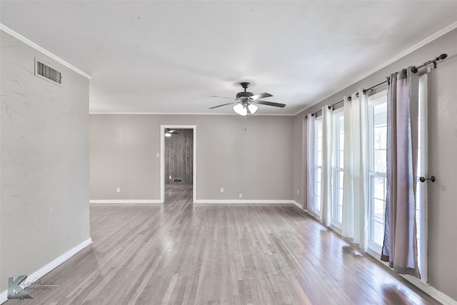 unfurnished room with ceiling fan, light hardwood / wood-style flooring, and ornamental molding