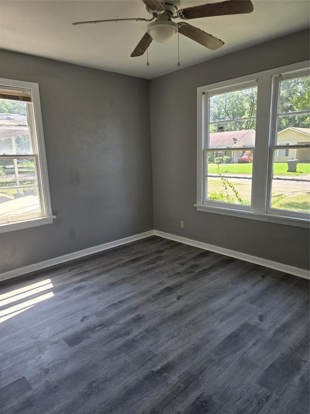 empty room with a wealth of natural light and ceiling fan