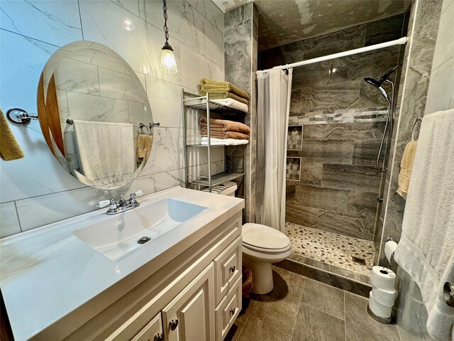 bathroom featuring vanity, a shower with curtain, backsplash, tile walls, and toilet