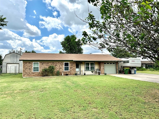 ranch-style home featuring a garage and a front lawn