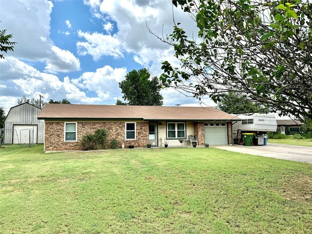 ranch-style home featuring a garage and a front yard