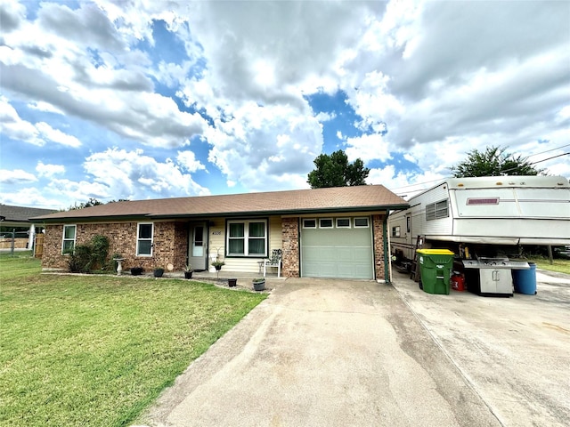 view of front of house with a garage and a front lawn