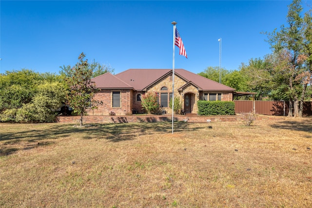 exterior space featuring a front lawn