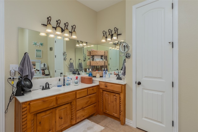 bathroom featuring tile patterned flooring and double sink vanity