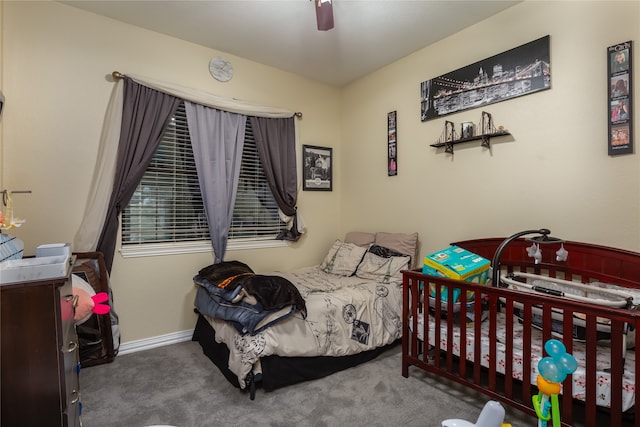 carpeted bedroom with ceiling fan