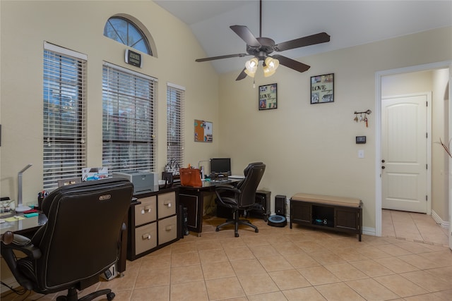 tiled home office with vaulted ceiling and ceiling fan