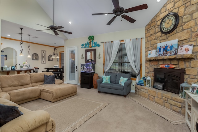 living room featuring light carpet, ceiling fan, and lofted ceiling