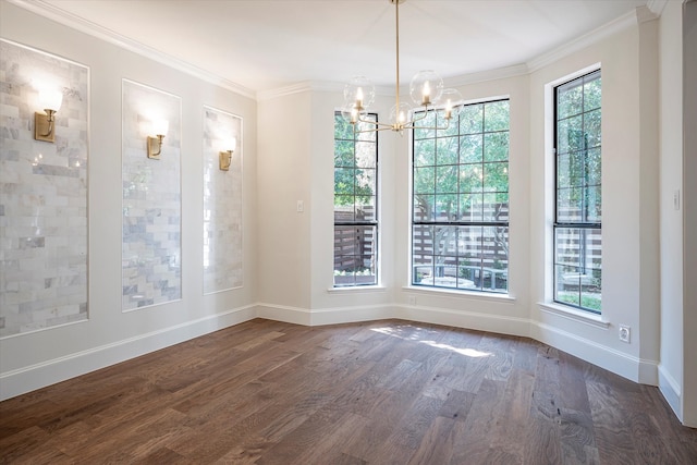 unfurnished dining area with an inviting chandelier, crown molding, and dark hardwood / wood-style floors