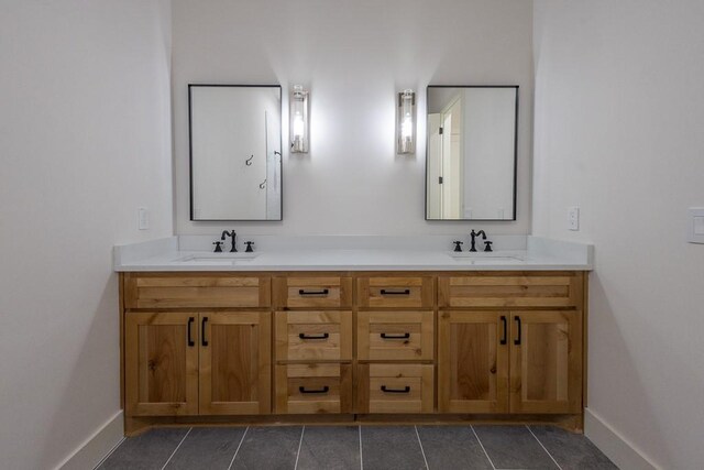 bathroom with vanity and tile patterned floors