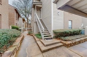 doorway to property with a patio