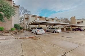 view of car parking with a carport