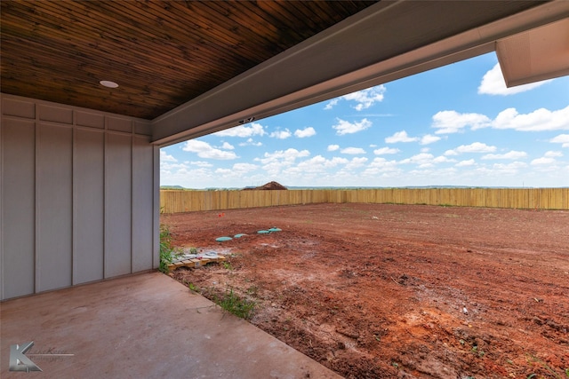 view of yard featuring a patio and a fenced backyard