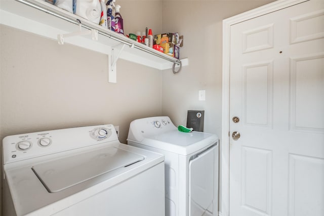 laundry area featuring separate washer and dryer