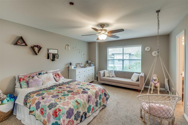 bedroom with light carpet and ceiling fan