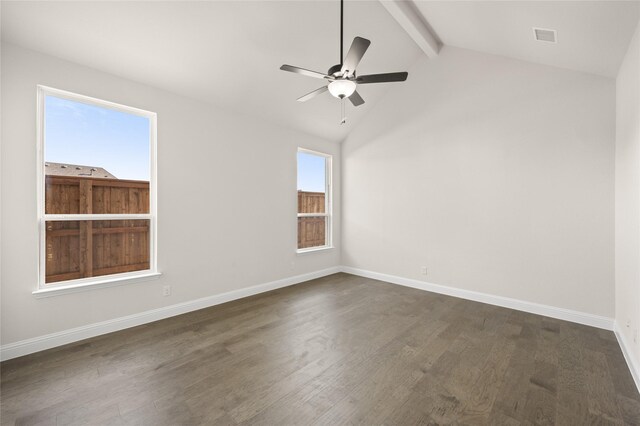 empty room with ceiling fan, lofted ceiling with beams, and dark hardwood / wood-style floors