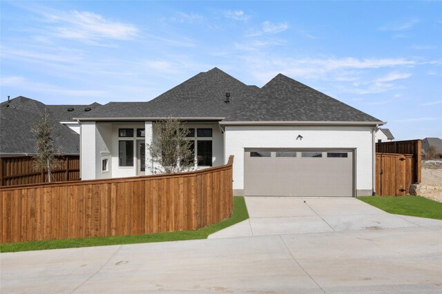 view of front of home with a garage