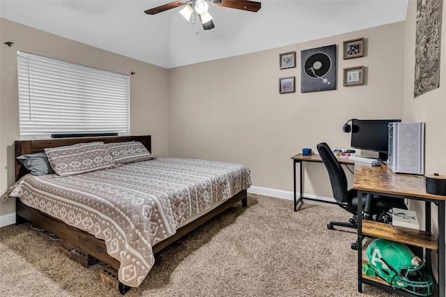 carpeted bedroom featuring ceiling fan, baseboards, and vaulted ceiling