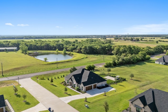 bird's eye view featuring a rural view and a water view