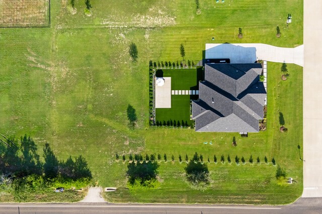 birds eye view of property featuring a rural view