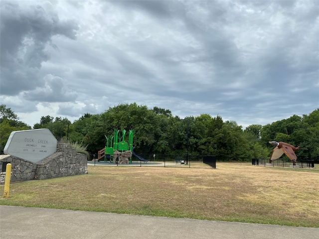 view of playground featuring a yard