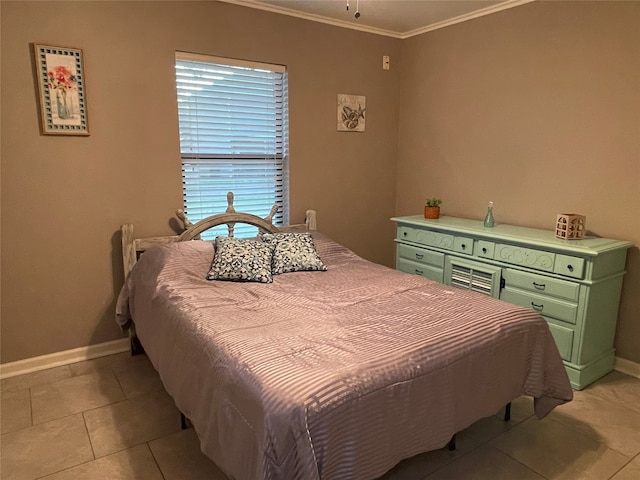 bedroom with tile patterned flooring and ornamental molding