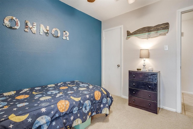 bedroom with carpet floors and ceiling fan