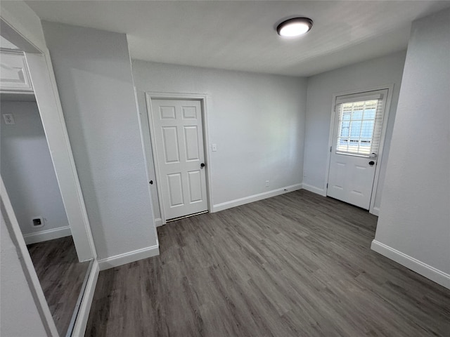 unfurnished room featuring wood-type flooring