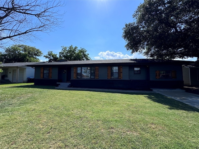 ranch-style house with a front lawn