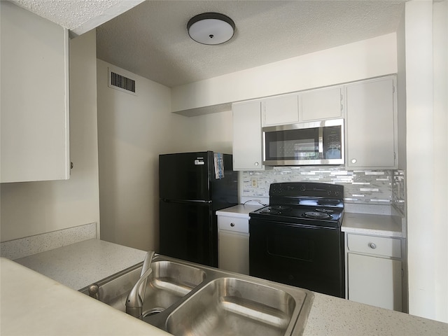 kitchen with white cabinetry, black appliances, sink, a textured ceiling, and backsplash