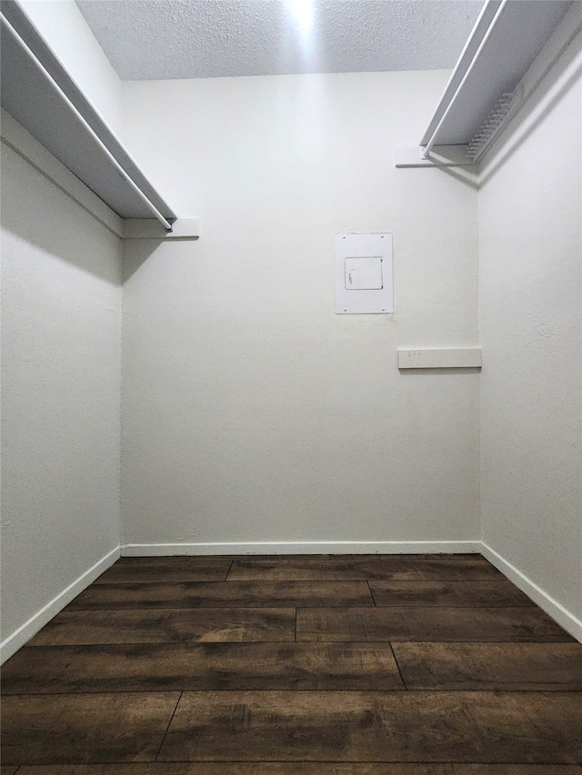 spacious closet featuring hardwood / wood-style flooring