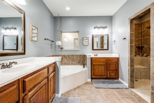 bathroom with separate shower and tub, tile patterned floors, and vanity