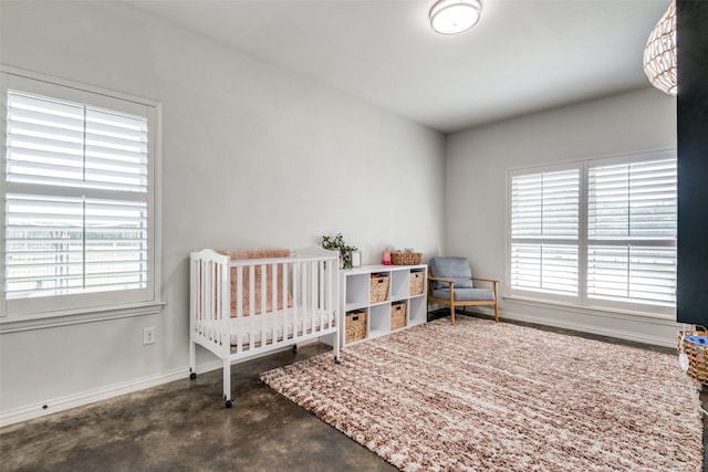 bedroom with a nursery area