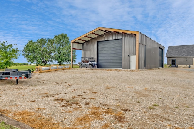 view of outbuilding featuring a garage