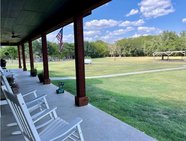 view of patio featuring ceiling fan