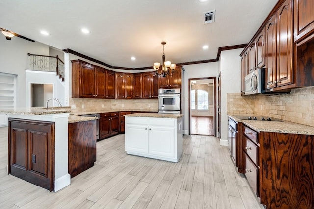 kitchen featuring pendant lighting, stainless steel appliances, kitchen peninsula, light hardwood / wood-style flooring, and crown molding