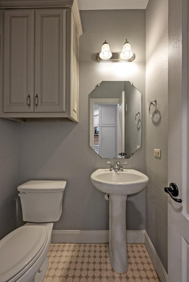 bathroom featuring toilet